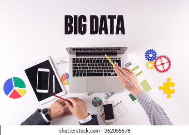 Business Team Working On Desk With A Single Word BIG DATA