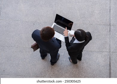 Business Team Working On Laptop, View From The Top