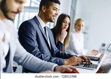 Business Team Working Together In Modern Office To Achieve Better Results