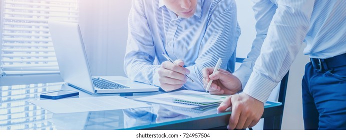 business team working together in the office, teamwork background banner - Shutterstock ID 724957504