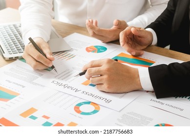 business teamwork Calculating Profit and Cost with Calculator, Growth Chart Analysis and Investing ,Business planning and strategies to maximize sales profits, long-term plans. - Shutterstock ID 2187756683