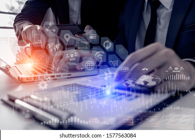 Business teamwork or business partners discussing documents and meeting at the office desk. Global Strategy Virtual Icon.Innovation Graphs Interfaces. Workplace strategy concept.