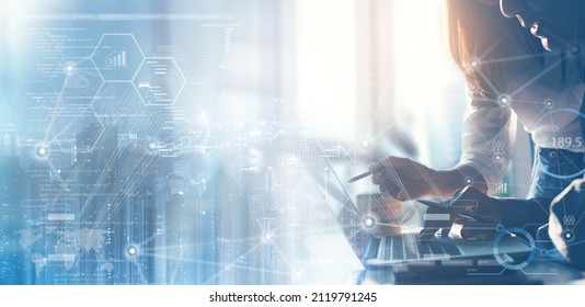 Business teamwork working on laptop computer at office with digital diagram, personal data, financial graph interfaces and internet network technology, futuristic virtual screen. business intelligence - Shutterstock ID 2119791245