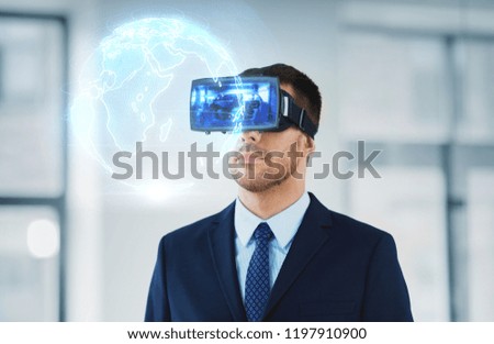 business, technology and augmented reality concept - businessman with vr headset and earth globe hologram at office