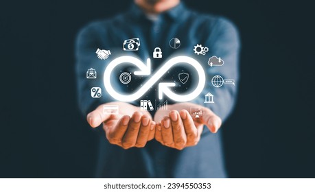 Business technology data link network concept. Businessman Hand show virtual infinity loop technology marketing online icon symbol of endless connection to community metaverse world network system