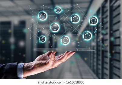 Business, technology and internet concept - businessman and network management - Shutterstock ID 1615018858