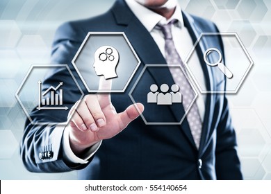 Business, technology, internet concept on hexagons and transparent honeycomb background. Businessman  pressing button on touch screen interface and select  brain
