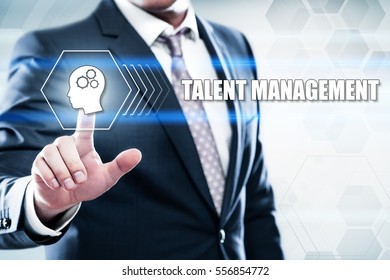 Business, technology, internet concept on hexagons and transparent honeycomb background. Businessman  pressing button on touch screen interface and select  talent management