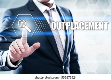 Business, technology, internet concept on hexagons and transparent honeycomb background. Businessman  pressing button on touch screen interface and select  outplacement