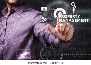 Business, Technology, Internet And Network Concept. Young Businessman Working On A Virtual Screen Of The Future And Sees The Inscription: Property Management