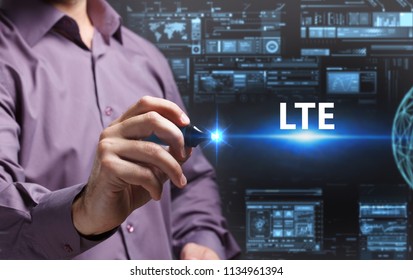 Business, Technology, Internet and network concept. Young businessman working on a virtual screen of the future and sees the inscription: LTE - Shutterstock ID 1134961394