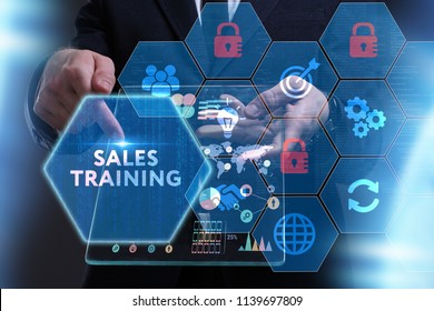 Business, Technology, Internet And Network Concept. Young Businessman Working On A Virtual Screen Of The Future And Sees The Inscription: Sales Training