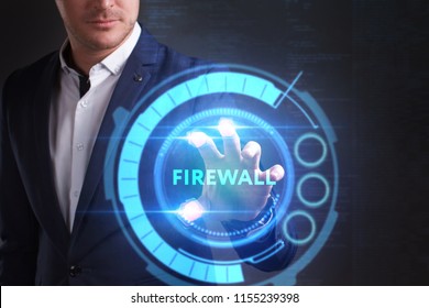 Business, Technology, Internet and network concept. Young businessman working on a virtual screen of the future and sees the inscription: Firewall