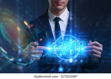 Business, Technology, Internet And Network Concept. Young Businessman Working On A Virtual Screen Of The Future And Sees The Inscription: Employee Engagement