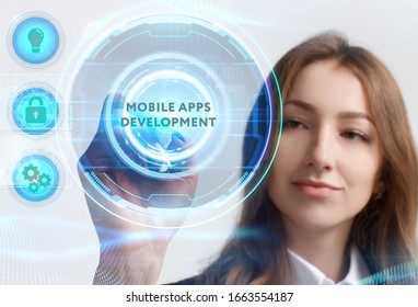 Business, Technology, Internet and network concept. Young businessman working on a virtual screen of the future and sees the inscription: Mobile apps development