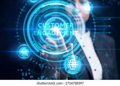 Business, Technology, Internet And Network Concept. Young Businessman Working On A Virtual Screen Of The Future And Sees The Inscription: Customer Engagement