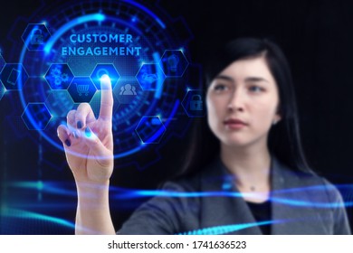 Business, Technology, Internet And Network Concept. Young Businessman Working On A Virtual Screen Of The Future And Sees The Inscription: Customer Engagement