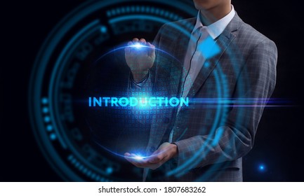 Business, Technology, Internet and network concept. Young businessman working on a virtual screen of the future and sees the inscription: Introduction - Shutterstock ID 1807683262