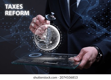 Business, Technology, Internet And Network Concept. Financial Graph. Stock Market Chart. Young Businessman Working On A Virtual Screen Of The Future And Sees The Inscription: Taxes Reform