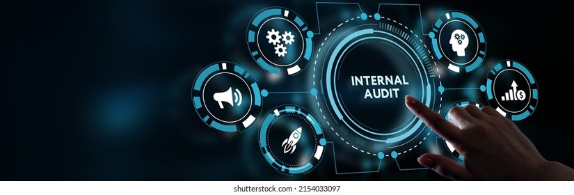 Business, Technology, Internet and network concept. Young businessman working on a virtual screen of the future and sees the inscription: Internal audit