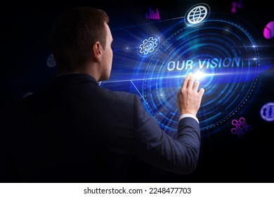 Business, Technology, Internet and network concept. Young businessman working on a virtual screen of the future and sees the inscription: Our vision - Shutterstock ID 2248477703