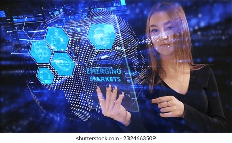 Business, Technology, Internet and network concept. Young businessman working on a virtual screen of the future and sees the inscription: Emerging markets - Shutterstock ID 2324663509