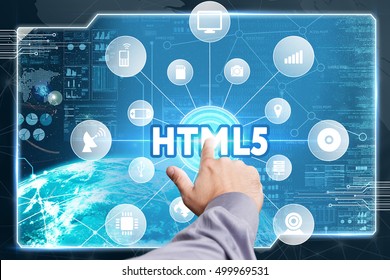 Business, Technology, Internet And Network Concept. Young Businessman Working On A Virtual Screen Of The Future And Sees The Inscription: HTML5