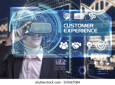 Business, Technology, Internet And Network Concept. Young Businessman Working In Virtual Reality Glasses Sees The Inscription: Customer Experience 