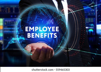 Business, Technology, Internet and network concept. Young businessman working in the field of the future, he sees the inscription: employee benefits 