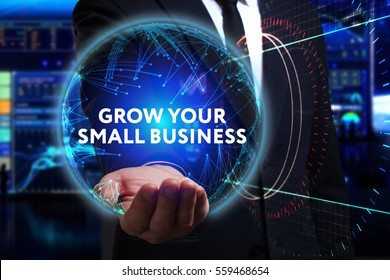 Business, Technology, Internet And Network Concept. Young Businessman Working In The Field Of The Future, He Sees The Inscription: Grow Your Small Business 