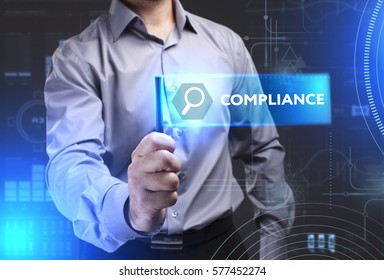 Business, Technology, Internet and network concept. Young businessman showing a word in a virtual tablet of the future: Compliance