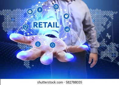 Business, Technology, Internet And Network Concept. Young Businessman Shows The Word On The Virtual Display Of The Future: Retail