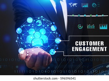 Business, Technology, Internet and network concept. Young businessman working on a virtual screen of the future and sees the inscription: Customer engagement