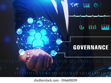 Business, Technology, Internet and network concept. Young businessman working on a virtual screen of the future and sees the inscription: Governance