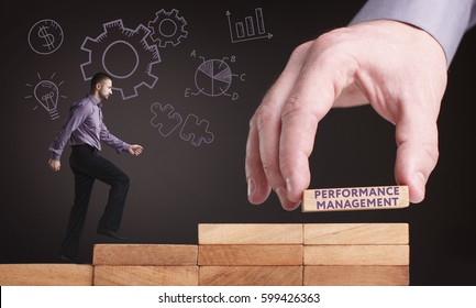 Business, Technology, Internet and network concept. Young businessman shows the word: Performance management - Shutterstock ID 599426363