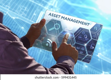  Business, Technology, Internet and network concept . Young business man working on the tablet of the future , select the virtual screen: Asset management