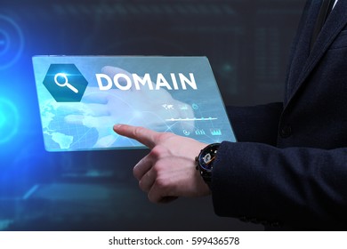 Business, Technology, Internet and network concept. Young businessman working on a virtual screen of the future and sees the inscription: Domain - Shutterstock ID 599436578