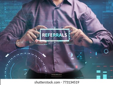 Business, Technology, Internet And Network Concept. Young Businessman Working On A Virtual Screen Of The Future And Sees The Inscription: Referrals