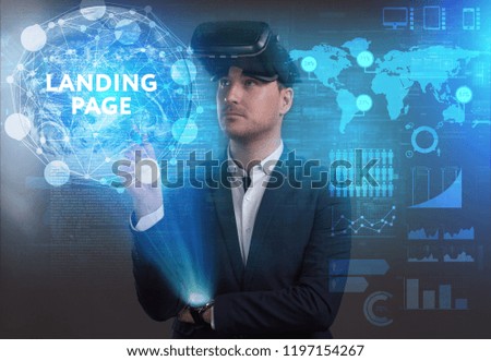 Business, Technology, Internet and network concept. Young businessman working on a virtual screen of the future and sees the inscription: Landing page