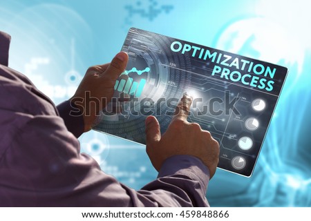 Business, Technology, Internet and network concept. Young business man, working on the tablet of the future, select on the virtual display: optimization process