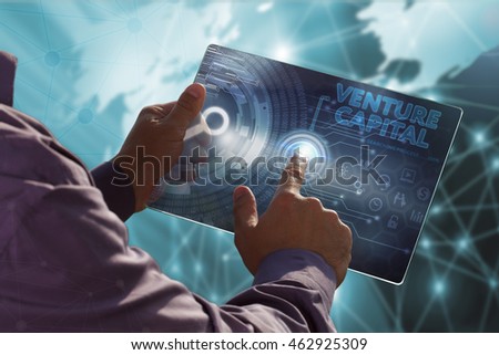 Business, Technology, Internet and network concept . Young business man working on the tablet of the future , select the virtual screen : venture capital