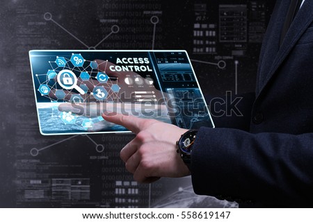 Business, Technology, Internet and network concept. Young businessman working on a virtual screen of the future and sees the inscription: access control 