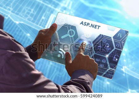  Business, Technology, Internet and network concept . Young business man working on the tablet of the future , select the virtual screen: ASP.NET
