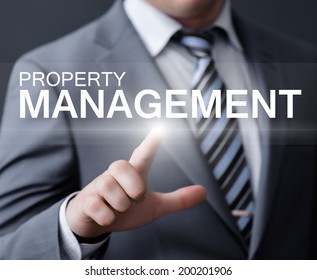 Business, Technology, Internet And Networking Concept - Businessman Pressing Property Management Button On Virtual Screens 