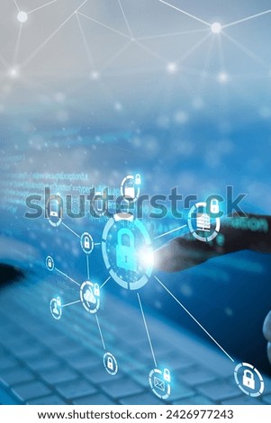 Business, technology, internet and networking concept. Young businesswoman working on his laptop in the office, select the icon security on the virtual display, vertical