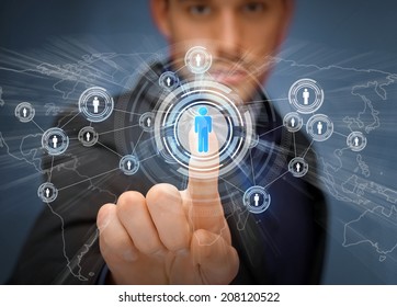 Business, Technology, Internet And Social Networking Concept - Businessman Pressing Button With Contact On Virtual Screens