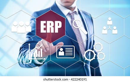 business, technology, internet and virtual reality concept - businessman pressing enterprise resource planning button on virtual screens with hexagons and transparent honeycomb - Shutterstock ID 422240191