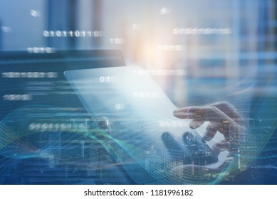 Business and technology, software development, IoT concept. Double exposure of man programmer, software developer working on digital tablet and smart city with binary, html computer code on screen