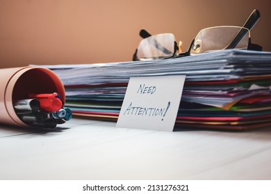 Business Text Memo Need Attention With Pile Of Documents On Table. Selective Focus On The Text. 