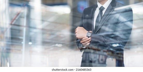 Business time concept. Businessman adjusting his wristwatch on his hand. - Powered by Shutterstock